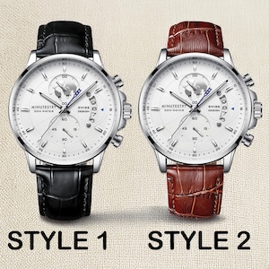 a couple of watches sitting next to each other