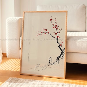Puede incluir: Impresión artística enmarcada con una ilustración minimalista de un pastor y una oveja, un árbol floreciente con flores rojas y el texto "The Lord is my Shepherd". La obra de arte es en negro y rojo sobre un fondo crema.