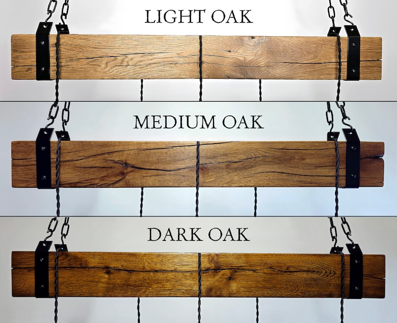 May include: Three reclaimed wood beams with black metal brackets and chains hanging from the ceiling. The beams are shown in three different wood stain colours: light oak, medium oak, and dark oak.