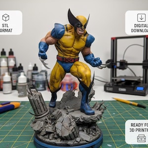 May include: A 3D printed figurine of the character Wolverine in a yellow and blue suit with metallic claws, standing on a gray rubble base. The image includes text labels for STL FORMAT, DIGITAL DOWNLOAD, and READY FOR 3D PRINTING.