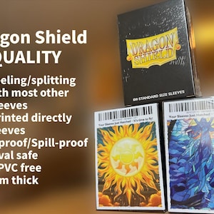 a box of dragon shield cards sitting on top of each other