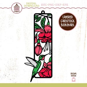 Puede incluir: Un diseño de marcapáginas rectangular de cartulina en capas con un colibrí verde y blanco cerca de flores fucsia de color rosa vibrante y hojas verdes. El archivo digital incluye formatos SVG, PNG, DXF y EPS con el texto Layered Cardstock Bookmark.