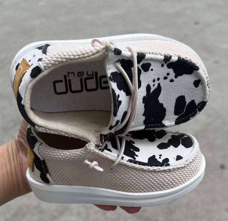 hey dudes cow print womens