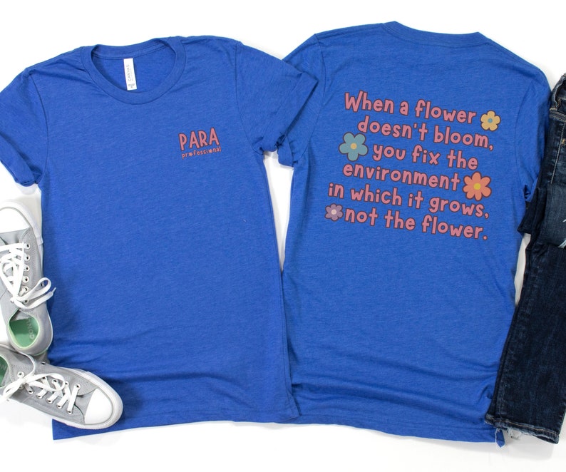 May include: Two blue t-shirts with a quote about flowers and the environment. The front shirt has the text "PARA professional" on the left chest. The back shirt has the text "When a flower doesn't bloom, you fix the environment in which it grows. not the flower."
