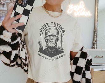 Comfort Colors Frankenstein Shirt Just Trying to Keep it Together tshirt Funny Halloween Tee Spooky Season Women's Boxy Tee