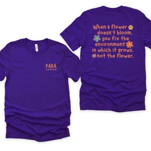 May include: Purple t-shirt with the text "PARA professional" on the front and the text "When a flower doesn't bloom, you fix the environment in which it grows, not the flower." on the back.