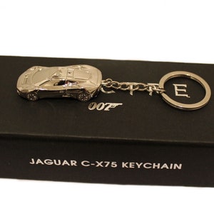 Porte-clés officiel Spectre Jaguar CX75 Car en métal argenté Porte-clés James Bond 007 Neuf avec boîte cadeau