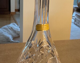 Handcut Lead Crystal Decanter made in Western Germany without stopper 12 inches in height. Sold at May Co.