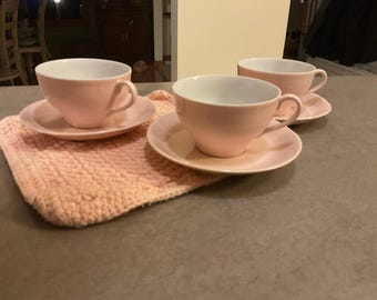 Porcelain pink and white teacups and saucers set of 3