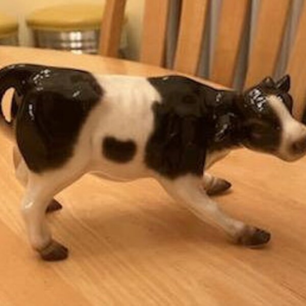 Porcelain Cow Figurine