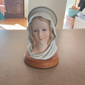 Enesco Designed Giftware Porcelain Virgin Mary bust statue with glass eyes and wooden base/NO BOX