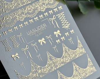 Adesivi per unghie con fiocco in pizzo e lamina dorata, french manicure, nail art elegante da sposa, unghie di lusso