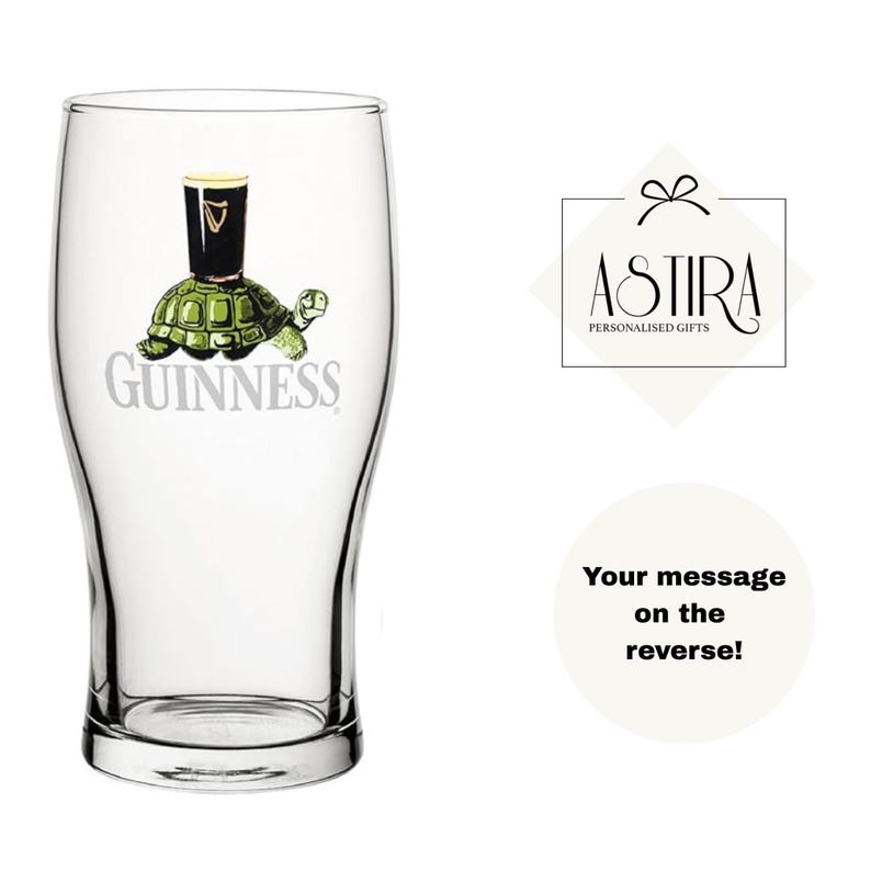 May include: A clear pint glass with a Guinness logo featuring a turtle carrying a pint of stout. The glass has a curved shape and a wide mouth. The text "Guinness" is printed below the turtle.