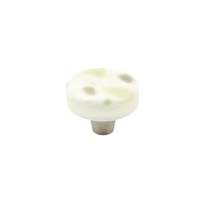 May include: White ceramic cabinet knob with a green and gray speckled pattern. The knob has a silver base.