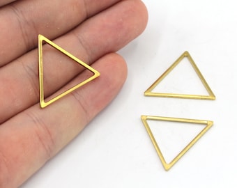 May include: Gold-coloured triangle-shaped jewellery findings. The open-frame geometric shapes are displayed against a white background. The findings are approximately 2.5 cm in size, suitable for crafting earrings, pendants, or other jewellery designs.