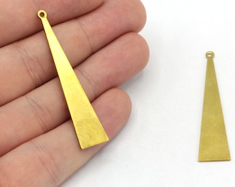 May include: Two gold-colored metal triangle-shaped pendant charms with a loop at the top.
