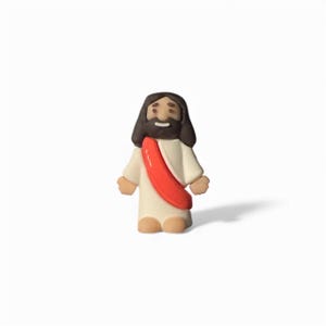 May include: A small figurine of Jesus Christ, depicted with dark brown hair and a beard. He wears a white robe with a red sash. The figurine has a smiling expression and is standing upright.