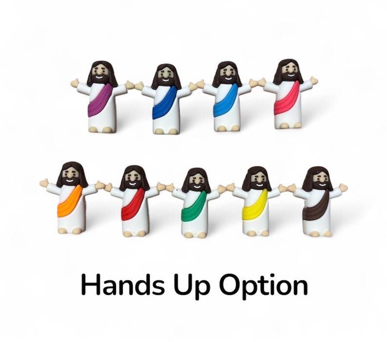 May include: A collection of small figurines depicting a figure with outstretched arms, each wearing a different colored sash. The figurines are white with brown hair and beards. The text "Hands Up Option" is at the bottom.