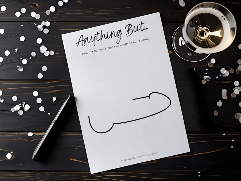 May include: A white sheet of paper with the text "Anything But..." and a line drawing of a penis. A black pen and a glass of champagne are on a dark wooden surface, with silver confetti scattered around.