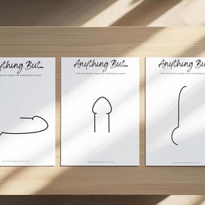 May include: Three white art prints with black line drawings of abstract shapes, each resembling a penis. The prints are arranged on a wooden surface. The text "Anything But..." is at the top of each print.