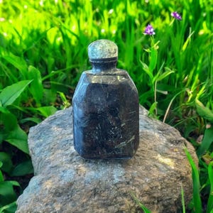 Chinese Carved Black Ore Snuff Bottle