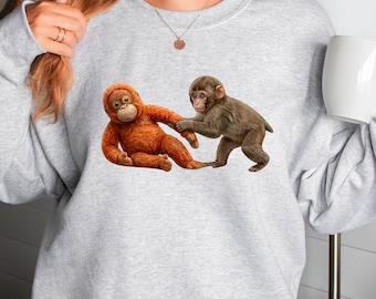 Monkey Punch Sweatshirt, Monkey Holding Plush Toy Sweatshirt, Emotional Animal Lover Hoodie