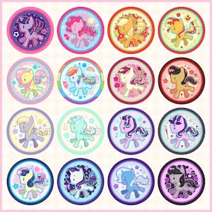 May include: A collection of sixteen circular stickers featuring colorful cartoon ponies. Each sticker has a unique pony design with various colors, including pink, purple, yellow, and blue. The stickers are set against a light pink background.