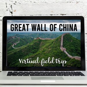 May include: A laptop screen displaying a virtual field trip to the Great Wall of China. The image shows a panoramic view of the wall winding through green hills.