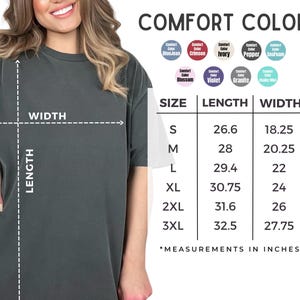 a woman wearing a grey t-shirt, with a table of measurements and a list of comfort colors displayed next to her.