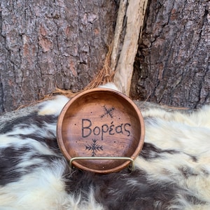 Boreus | Greek winter deity offering bowl