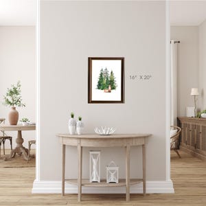 Puede incluir: Una pintura de acuarela enmarcada que representa una escena de bosque con tres &aacute;rboles verdes y un peque&ntilde;o ciervo en el centro. El marco es de madera marr&oacute;n y el passe-partout es blanco. La pintura mide 16 pulgadas por 20 pulgadas.
