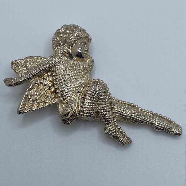 Broche vintage de querubín en tono plateado