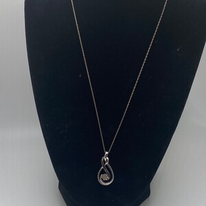 Tear drop tiny pearl and diamond pendant on silver chain