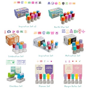 May include: Assortment of colorful stamp sets with various motivational and inspirational phrases. The sets include "Inspiration Set v2", "North Star Set", "Celebration Set", "Inspiration Set", "Motivation Set", "Checkbox Set", "Planner Set", and "Margin Notes Set".
