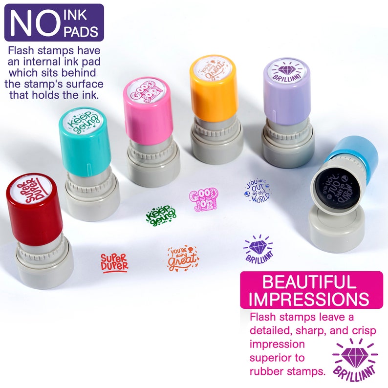 May include: Set of eight colorful self-inking stamps with various motivational phrases like "You're doing great", "Good job", and "Keep going". The stamps are arranged on a white surface with a diamond-shaped stamp that says "Brilliant" in the bottom right corner. The text "NO INK PADS" is at the top of the image.