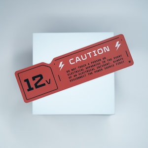 Caution Shock Hazard Vinyl Sticker: Cyberpunk Sci-Fi Gaming Dystopian Tech Decal
