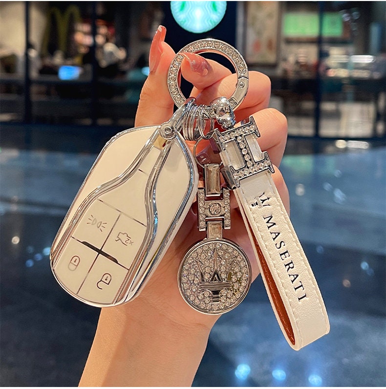 white louis vuitton keychain