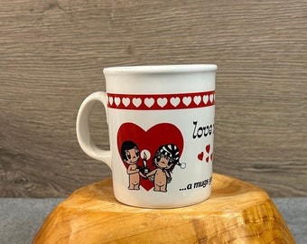 Vintage 1970 'Love Is... a mugs game???!' Kim Casali White Ceramic Mug Cup | Collectible MCM Kitsch Merchandise| Valentine's Art Kitchenalia