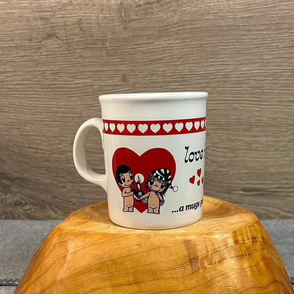Vintage 1970 'Love Is... a mugs game???!' Kim Casali White Ceramic Mug Cup | Collectible MCM Kitsch Merchandise| Valentine's Art Kitchenalia