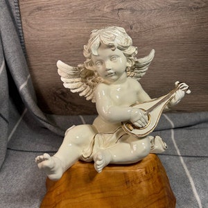 Vintage Rococo Style Era Large Cream Off White Painted Chalkware Plaster Cherub Angel Statue with Golden Wings Playing the Lute Sculpture