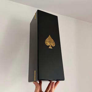 May include: A rustic wooden sign with the text "Welcome to our home" in white lettering. The sign features a distressed finish and a simple, inviting design, perfect for a front porch or entryway.