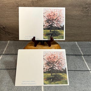 23 tarjetas de felicitación de segunda mano de una serie de pinturas al óleo de Sue Simpson (Scot Cards) con flores de cerezo en los jardines Regent de Edimburgo, Escocia.