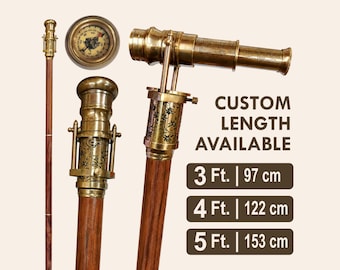 May include: A wooden walking stick featuring a brass handle shaped like a marine telescope and a compass. The brass components are engraved with floral patterns and the text 1920. Text indicates custom lengths of 97 cm, 122 cm, and 153 cm are available.