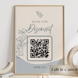 Könnte beinhalten: Ein gerahmtes Poster mit beigem Hintergrund zeigt einen QR-Code und die Worte "SCAN FOR Discount" in eleganter Schrift. Florale Illustrationen und der Text "THANK YOU!" sind ebenfalls vorhanden. Der Satz "Edit in Canva" befindet sich in der unteren rechten Ecke.