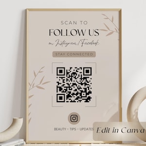 May include: Framed beige poster with text "SCAN TO FOLLOW US on Instagram/Facebook" and a QR code. Includes the text "STAY CONNECTED" and "BEAUTY - TIPS - UPDATES". The words "Edit in Canva" are also visible.