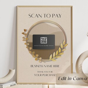 Könnte beinhalten: Ein gerahmtes Schild mit dem Text "SCAN TO PAY" oben. Ein goldfarbenes Kreisdesign umgibt eine schwarze Karte mit einem QR-Code. Das Schild enthält auch den Text "BUSINESS NAME HERE" und "THANK YOU FOR YOUR PURCHASE!"