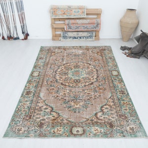 Handmade Wool Oushak Rug: 5x9 Vintage Turkish Anatolian Rug