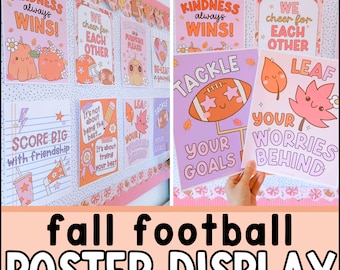 May include: A classroom bulletin board decorated with colorful posters featuring fall and football themes. The posters have motivational messages like "Kindness always wins!" and "Score big with friendship!"  The posters also feature cute illustrations of pumpkins, footballs, and leaves.