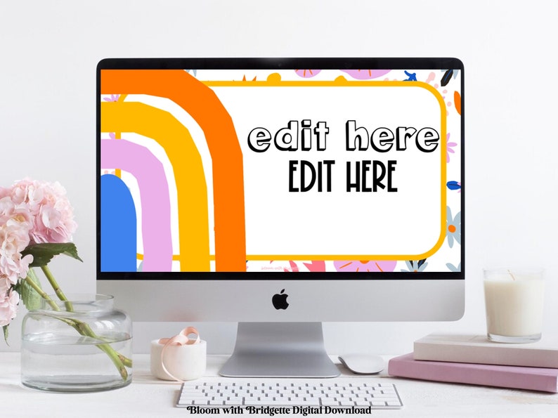 Peut inclure: Un &eacute;cran d'ordinateur affichant un fond d'&eacute;cran num&eacute;rique color&eacute; avec un motif arc-en-ciel et le texte "edit here EDIT HERE" dans une bo&icirc;te blanche.