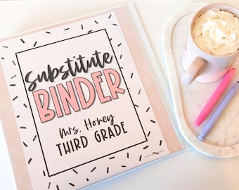 May include: A pink and black substitute binder with the text "Substitute Binder" in black and pink lettering. The text "Mrs. Honey Third Grade" is also included in black lettering.